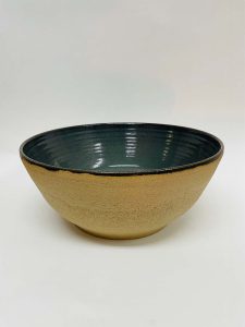 ceramic bowl - dark inner glaze and a beige outer glaze