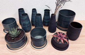 black and green ceramic planters and vases