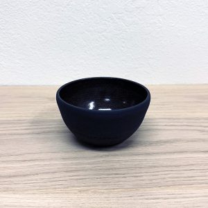 black ceramic bowl