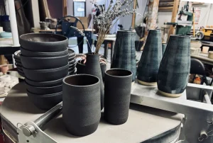 Black ceramic pottery on a kiln